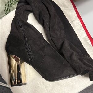 Elegant Black Boots with Gold Heel